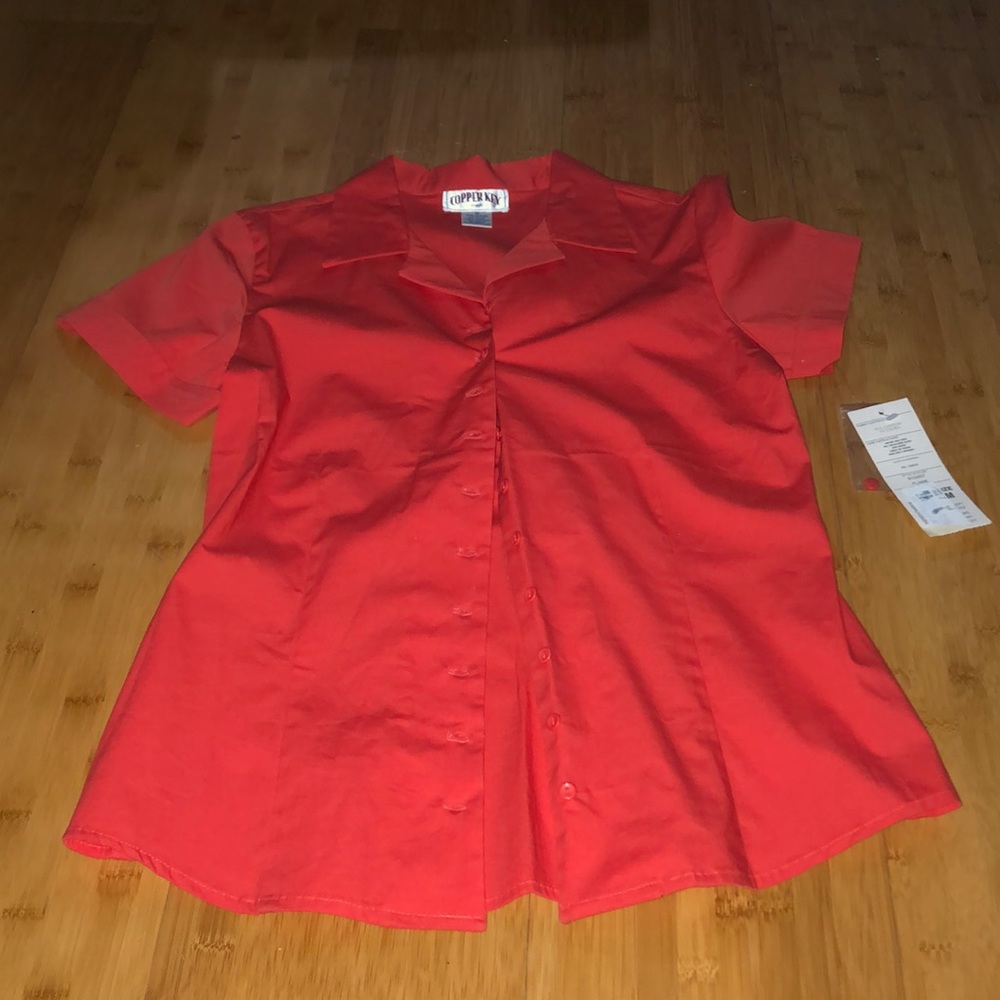 Red-orange button up shirt